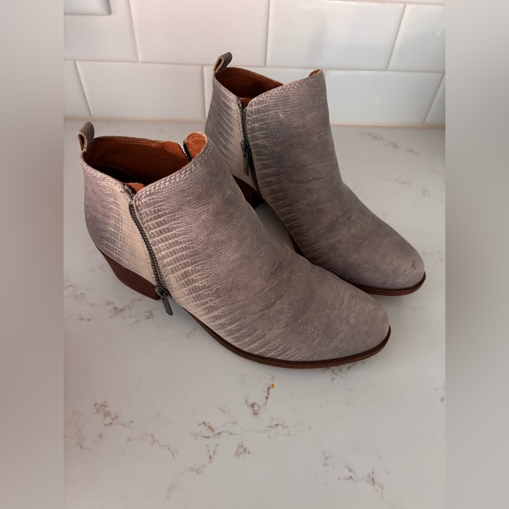 Great condition lucky brand booties. Size 8.5. Grey snake print side zipper.
